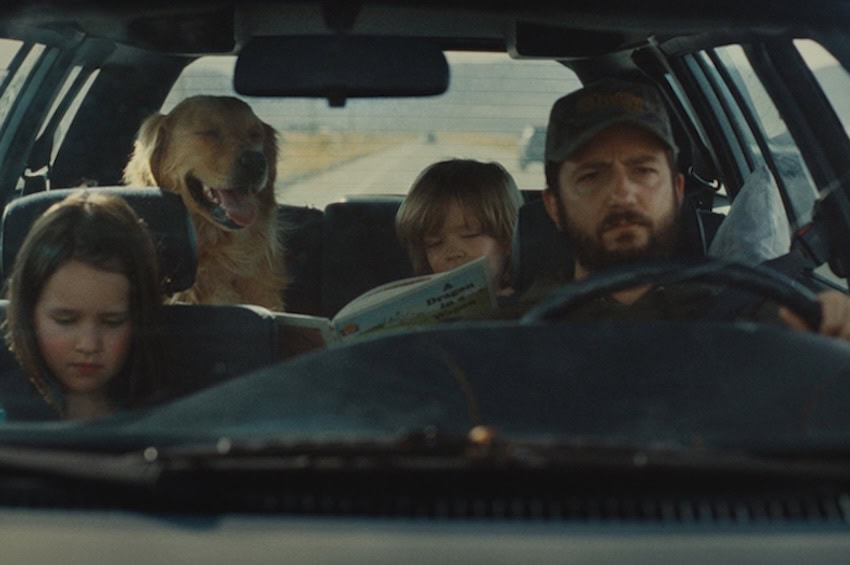 family in car