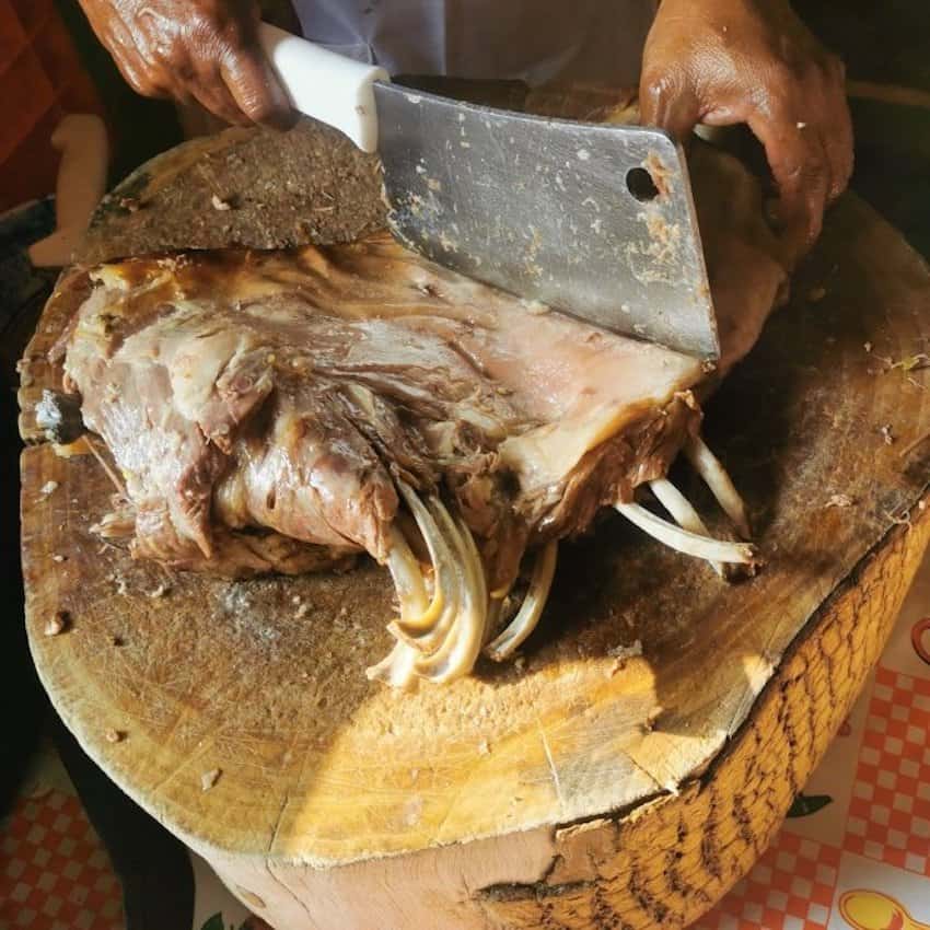 Lamb being cut