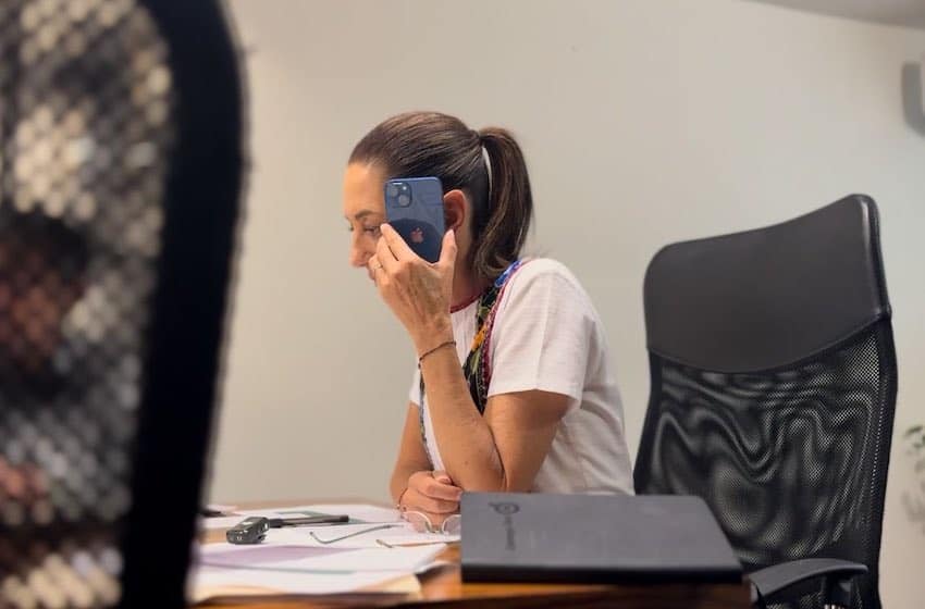 Sheinbaum taking a phone call
