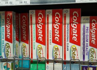 a shelf of toothpaste